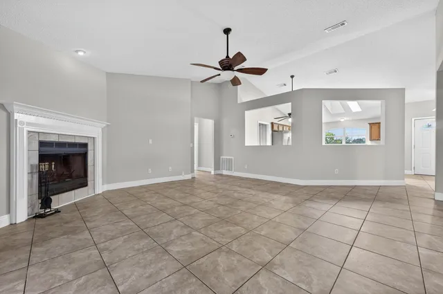a view of an empty room and window