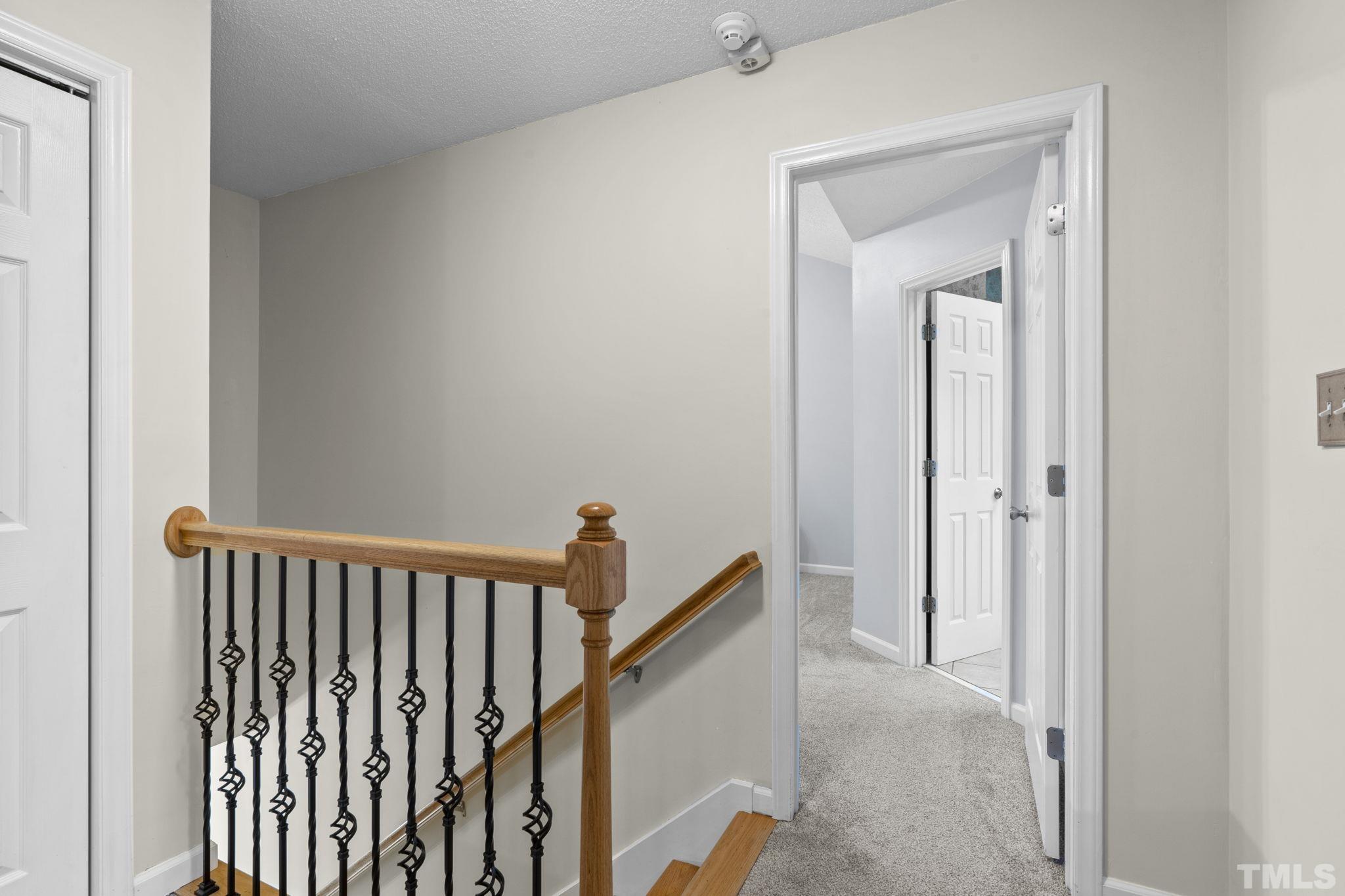 1101 Sky Point Court Raleigh, NC 27603 - Photo 21 of 52 a view of a hallway with wooden floor and entryway