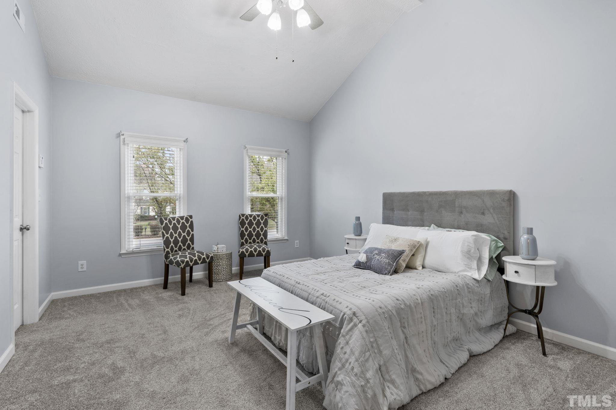 1101 Sky Point Court Raleigh, NC 27603 - Photo 23 of 52 a bedroom with a bed and a window