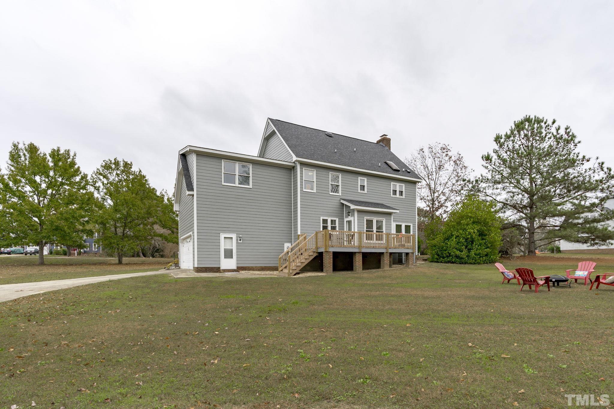 1101 Sky Point Court Raleigh, NC 27603 - Photo 39 of 52 a front view of a house with a yard