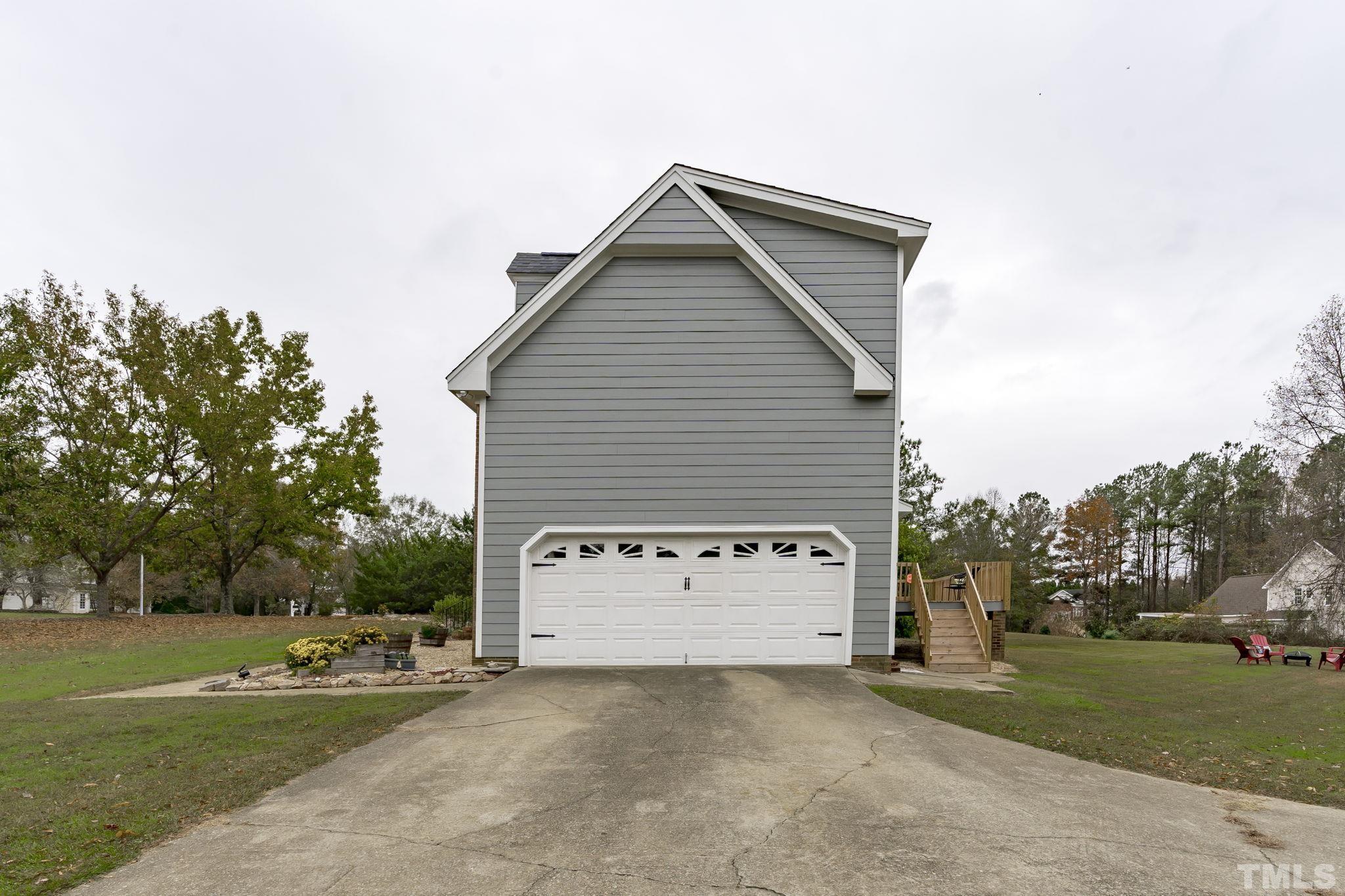 1101 Sky Point Court Raleigh, NC 27603 - Photo 48 of 52 a view of a house with a yard