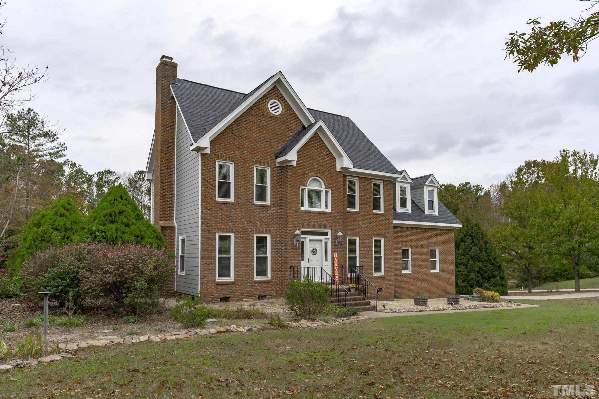 1101 Sky Point Court Raleigh, NC 27603 - Photo 52 of 52 front view of house with a yard