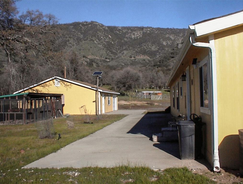 39950 Millwood Road Dunlap, CA 93621 - Photo 45 of 64 a view of a house with a yard