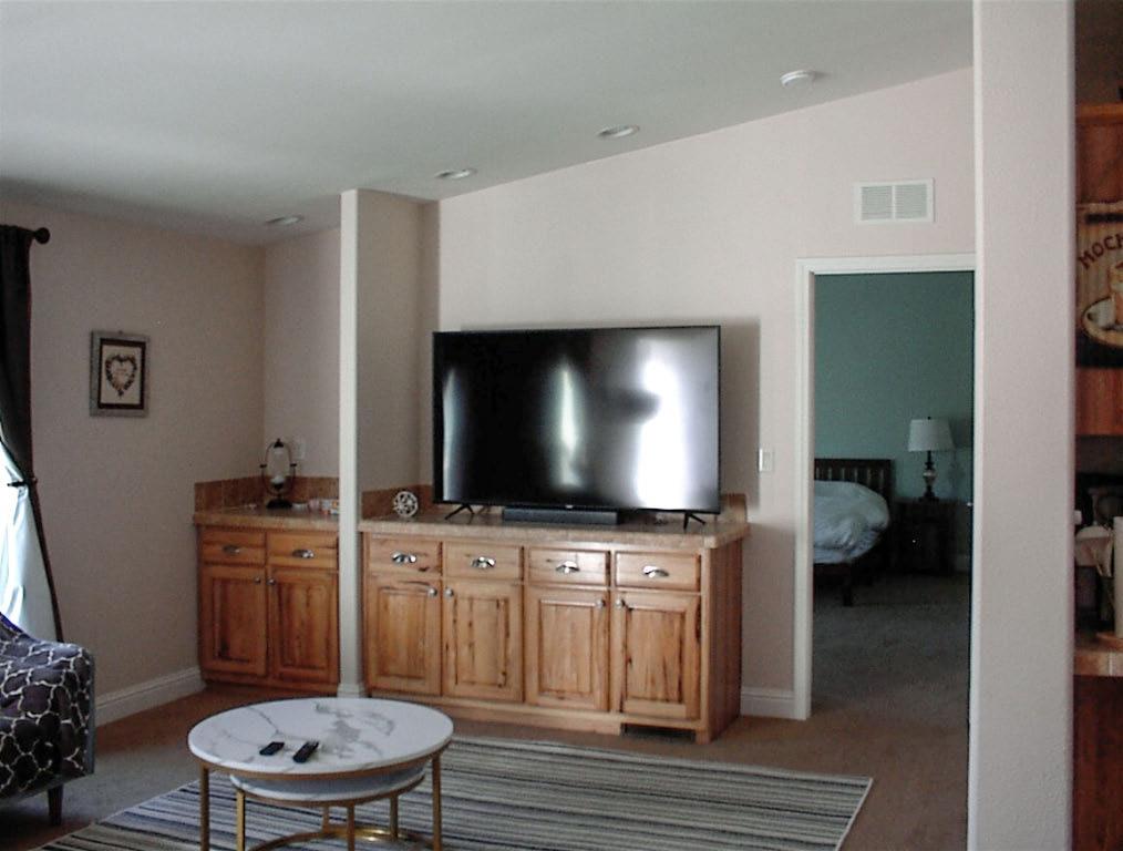 39950 Millwood Road Dunlap, CA 93621 - Photo 57 of 64 a living room with furniture and a flat screen tv