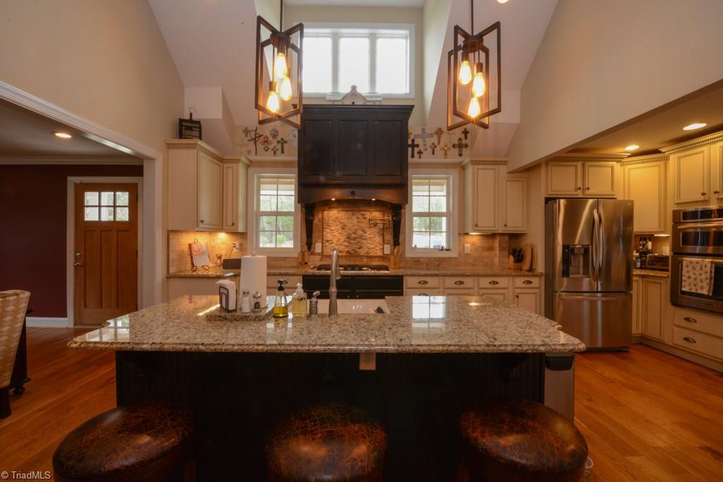 5254 Wallburg-High Point Road High Point, NC 27265 - Photo 6 of 30 Wonderful island and chefs kitchen with gas cooktop and lots of natural light