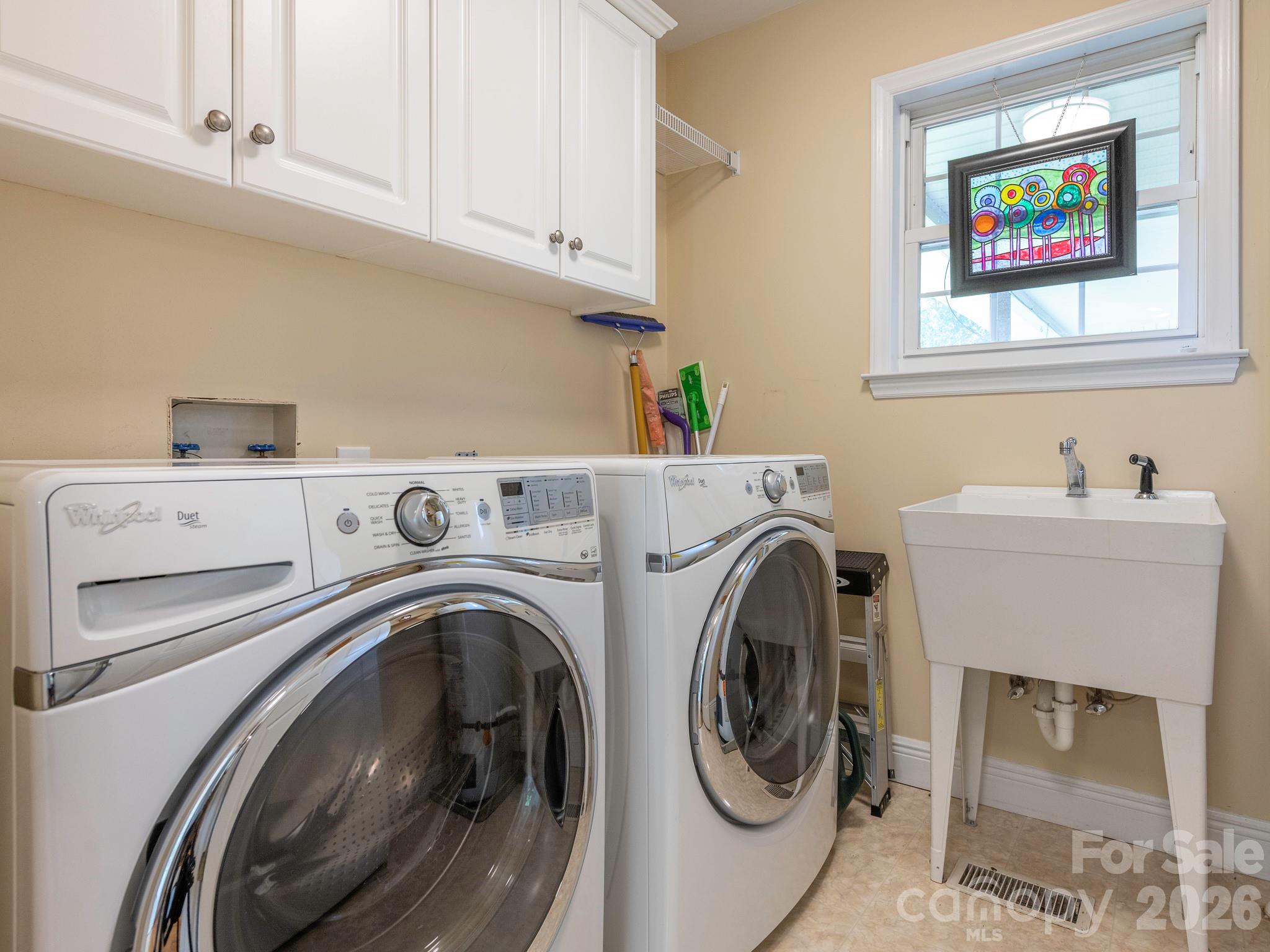 4440 Hucks Road Charlotte, NC 28269 - Photo 31 of 45 a utility room with dryer and washer