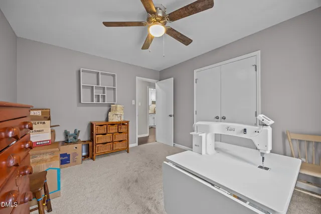 a bedroom with a bed and furniture