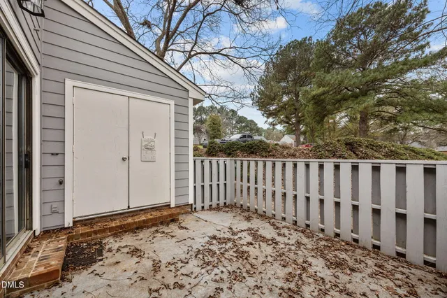 a view of a wooden fence