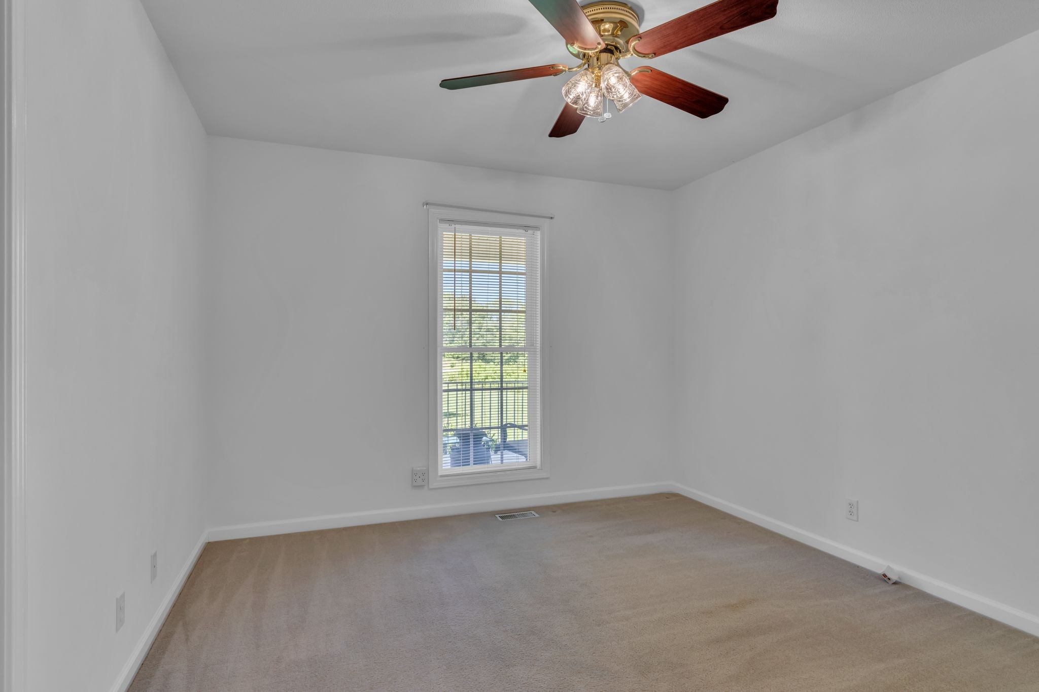 4111 Highway 49 Springfield, TN 37172 - Photo 18 of 46 an empty room with windows and fan