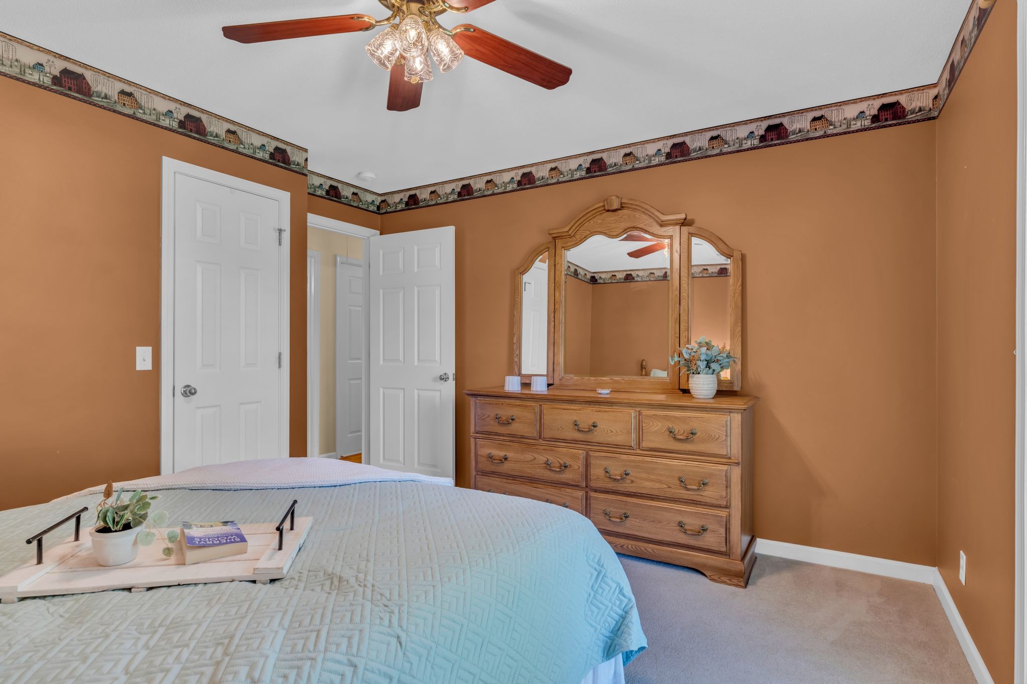 4111 Highway 49 Springfield, TN 37172 - Photo 21 of 46 a bedroom with a bed and a mirror on the dresser