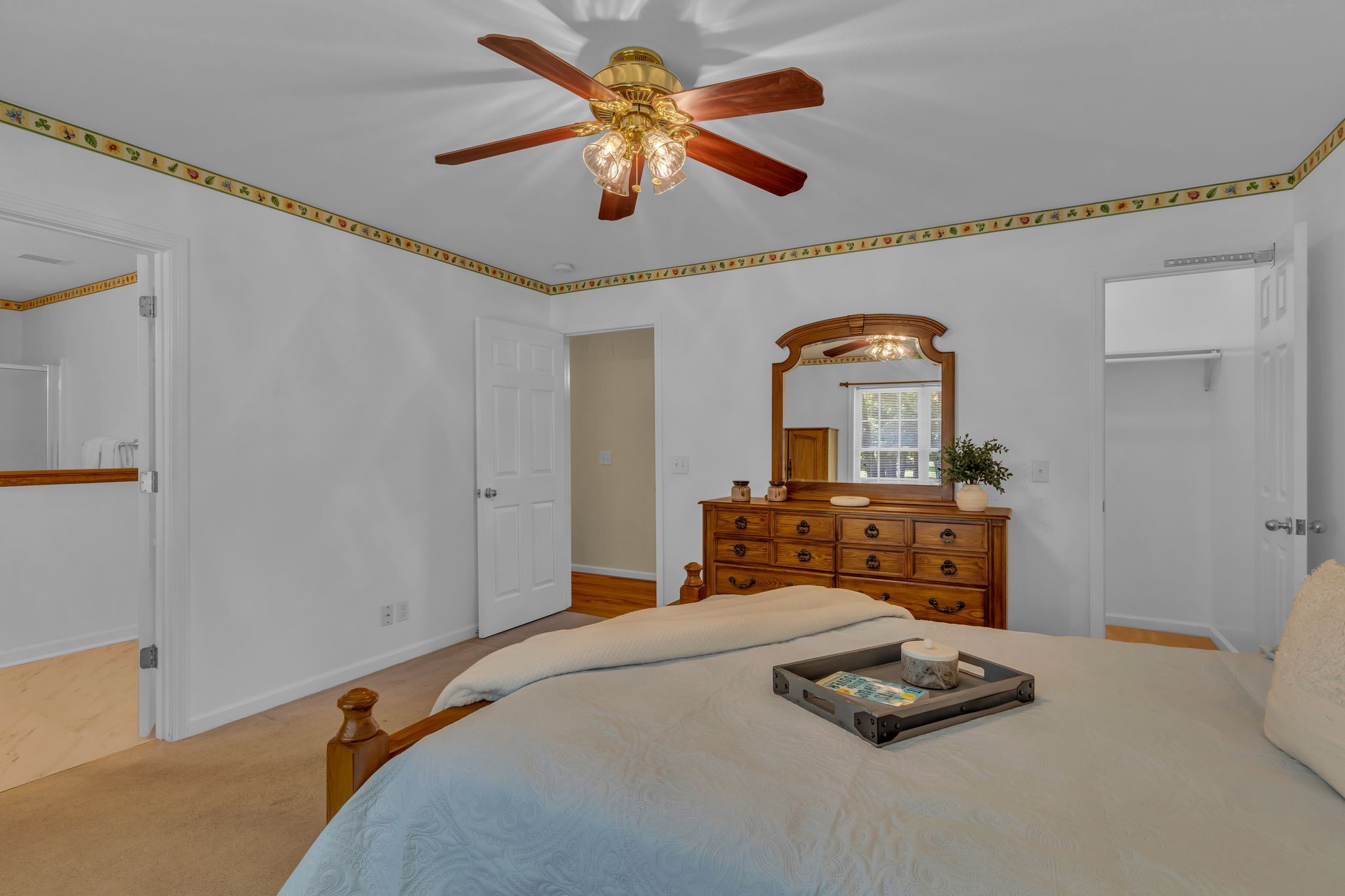 4111 Highway 49 Springfield, TN 37172 - Photo 23 of 46 a bedroom with a bed and a chandelier