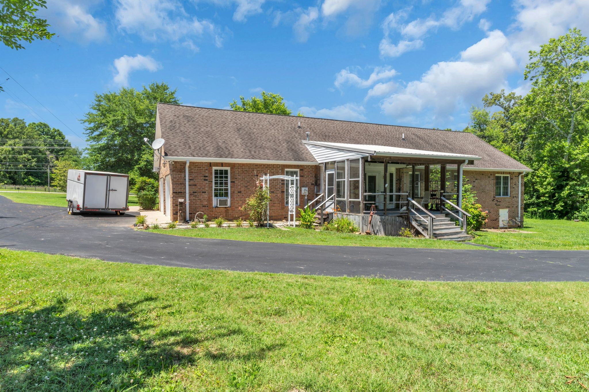 4111 Highway 49 Springfield, TN 37172 - Photo 31 of 46 a view of a house with a yard and a garden