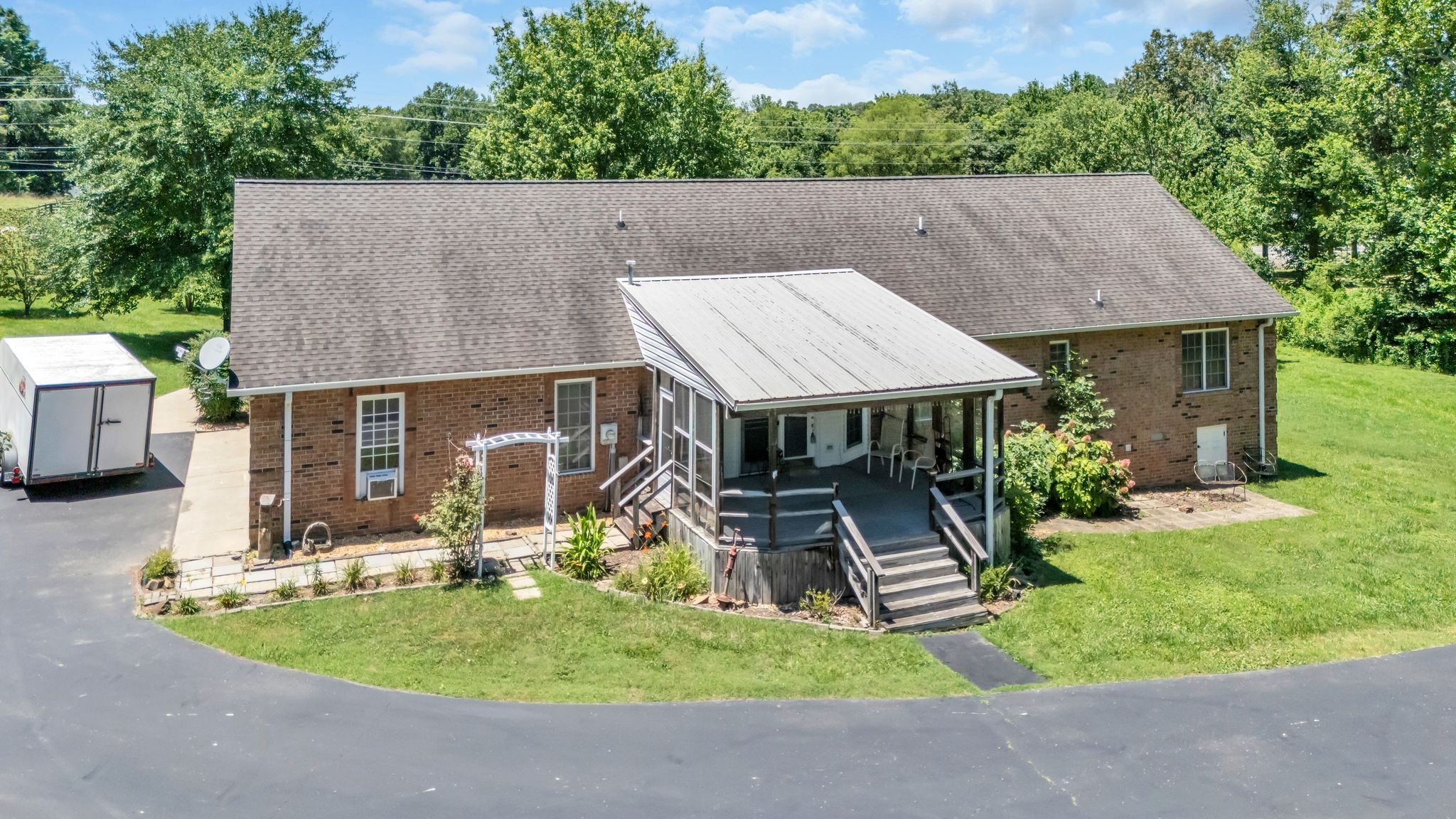 4111 Highway 49 Springfield, TN 37172 - Photo 38 of 46 an aerial view of a house with swimming pool and garden