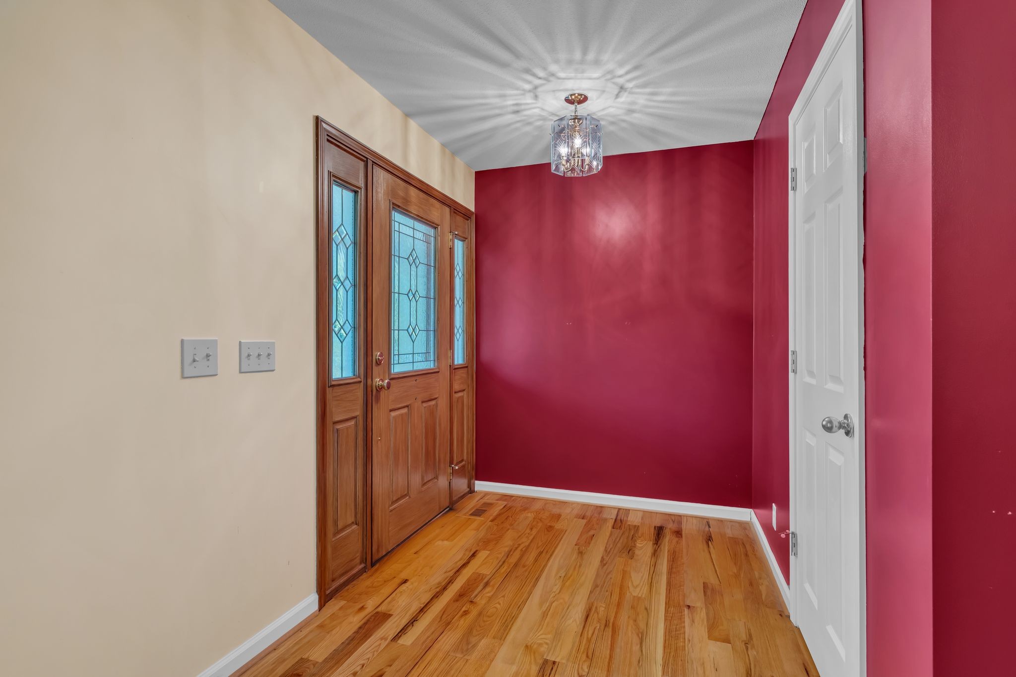 4111 Highway 49 Springfield, TN 37172 - Photo 8 of 46 an empty room with wooden floor and chandelier fan