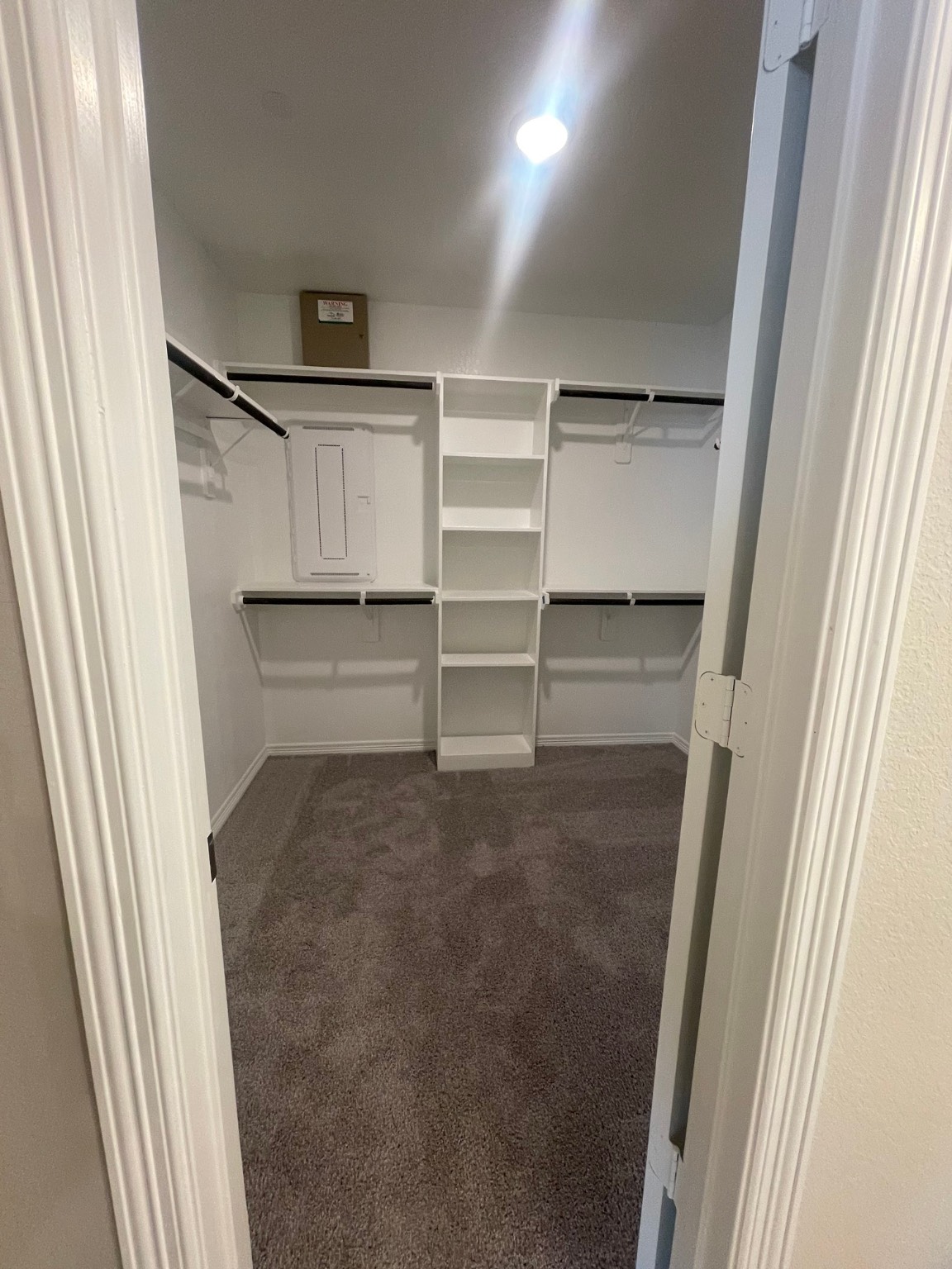8024 Scanlan Trail Missouri City, TX 77459 - Photo 6 of 11 a view of walk in closet with empty racks