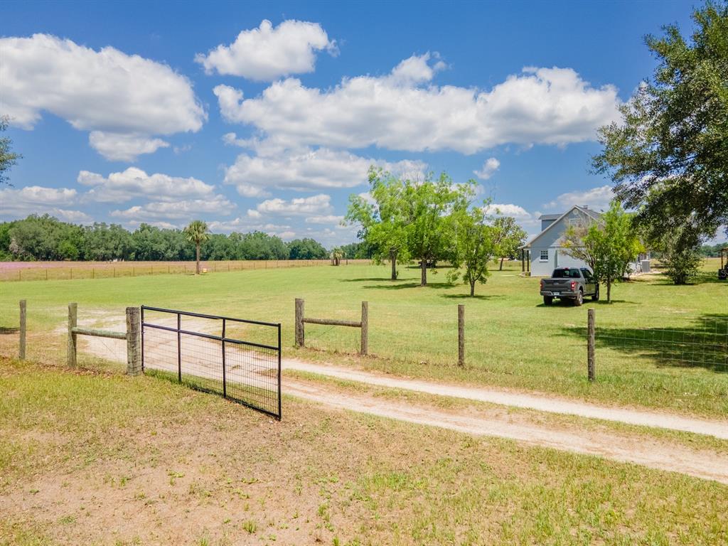 4381 Northeast 105th Place Anthony, FL 32617 - Photo 4 of 49 a view of lake with a yard