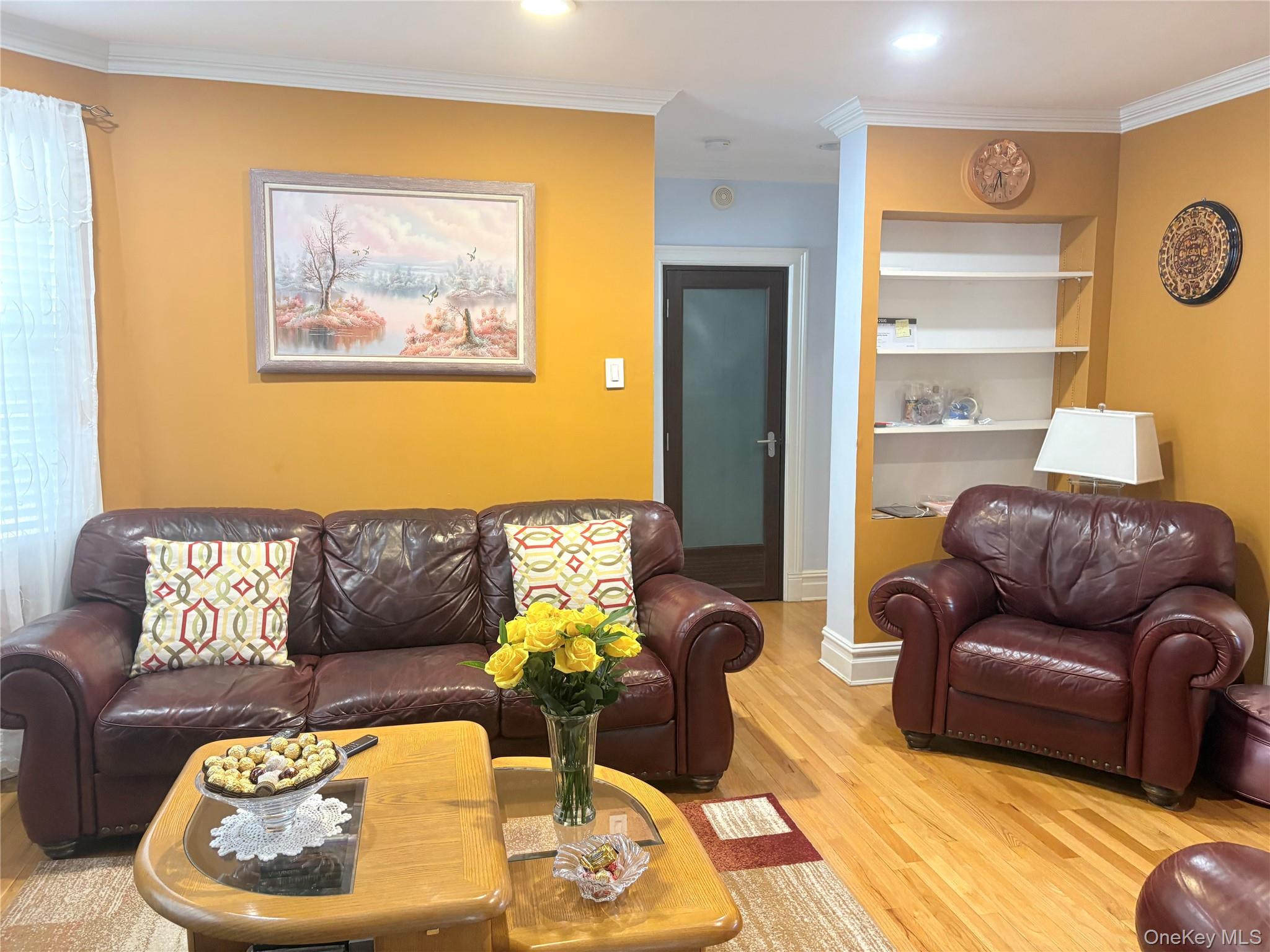 25 Rutland Road Freeport, NY 11520 - Photo 14 of 31 a living room with furniture and a window