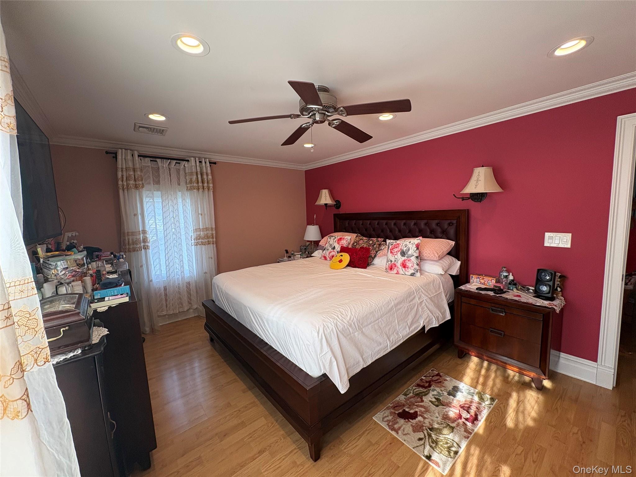25 Rutland Road Freeport, NY 11520 - Photo 5 of 31 a bed room with a bed and a gym