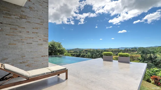 a view of a patio with swimming pool and porch