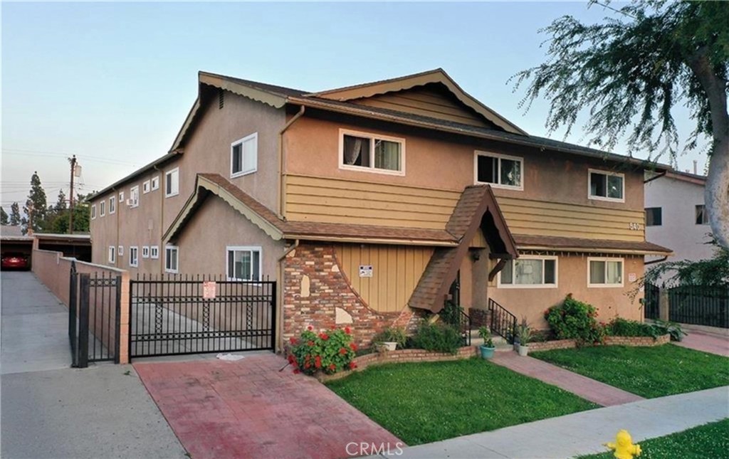540 South 6th Street, Unit G Montebello, CA 90640 - Photo 1 of 1 a front view of a house with a garden