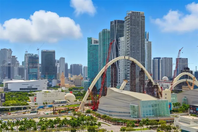 a view of a city with tall buildings