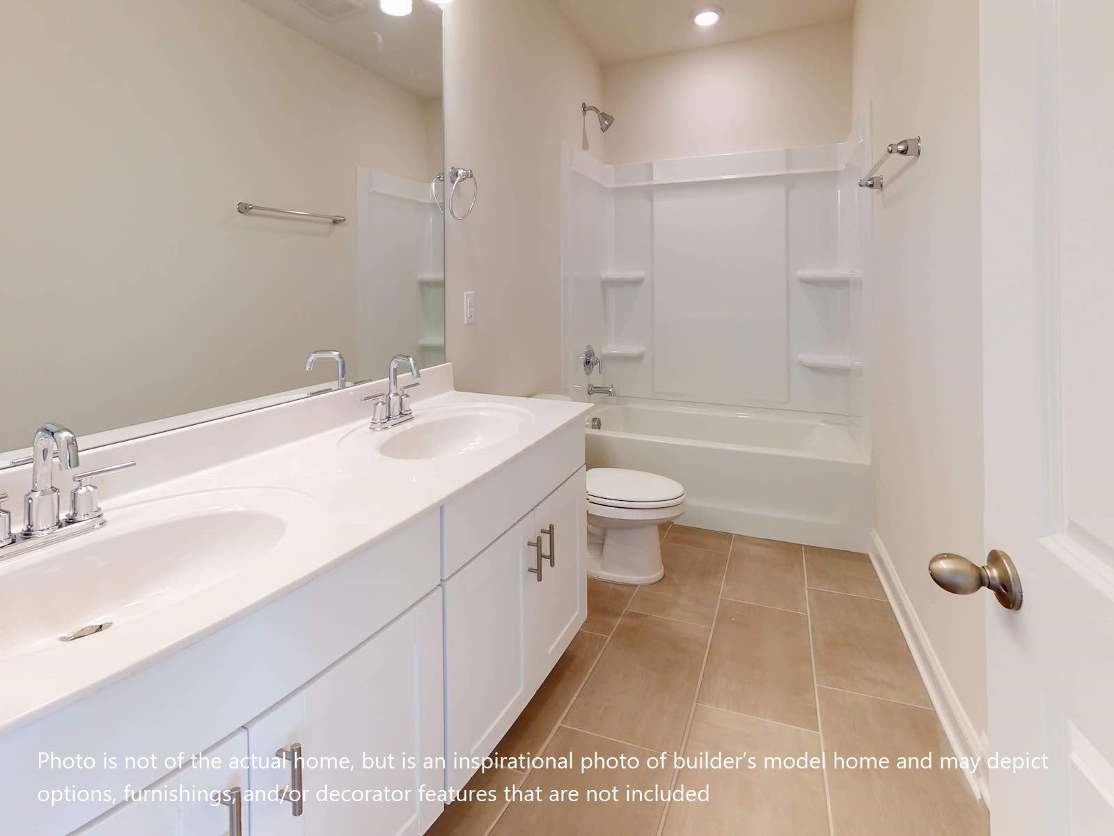 1100 Holland Ridge Way Lebanon, TN 37090 - Photo 12 of 20 a bathroom with a double vanity sink toilet mirror and shower