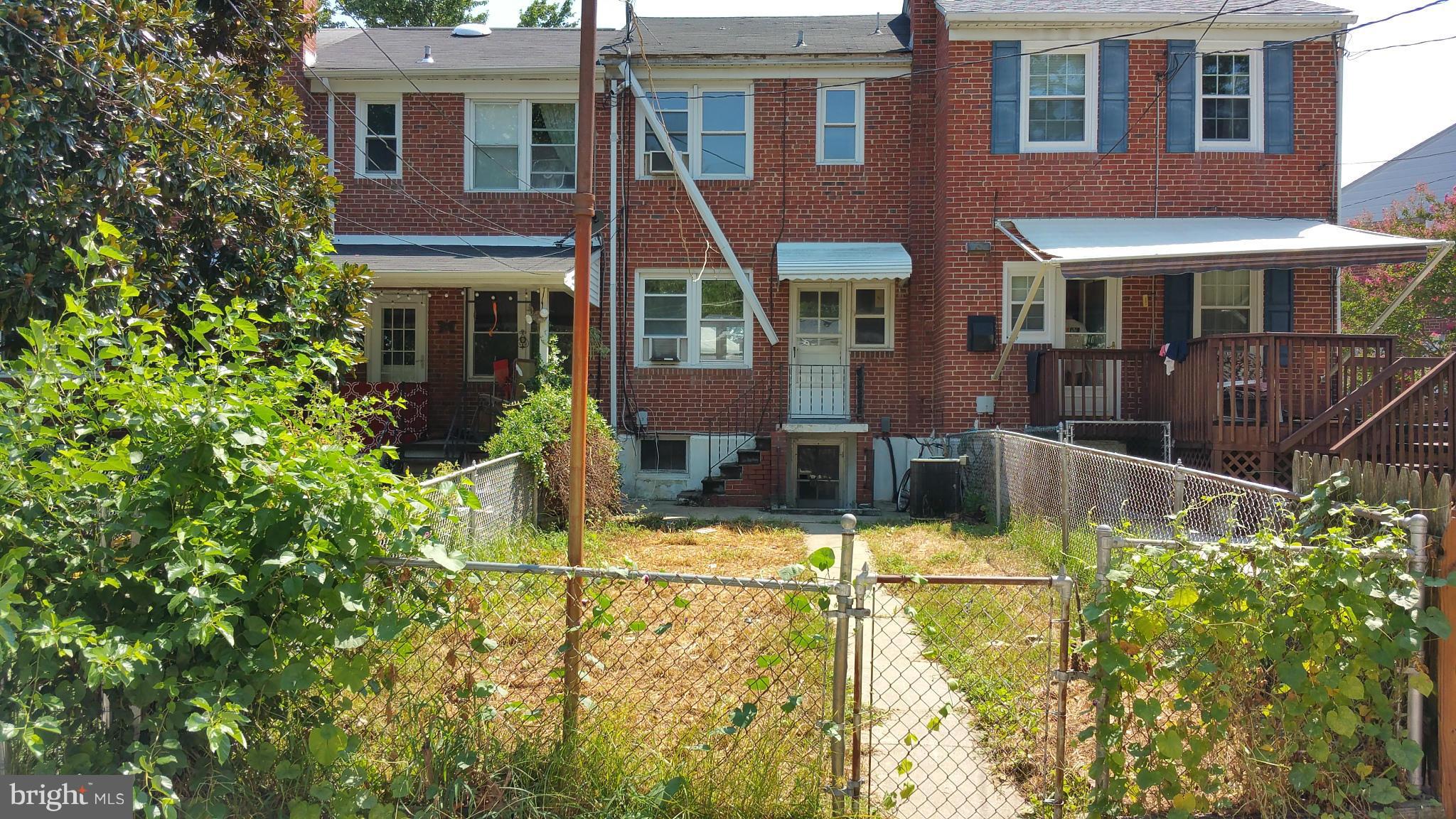 516 Chalcot Square Baltimore, MD 21221 - Photo 9 of 10 a view of a house with swimming pool and sitting area
