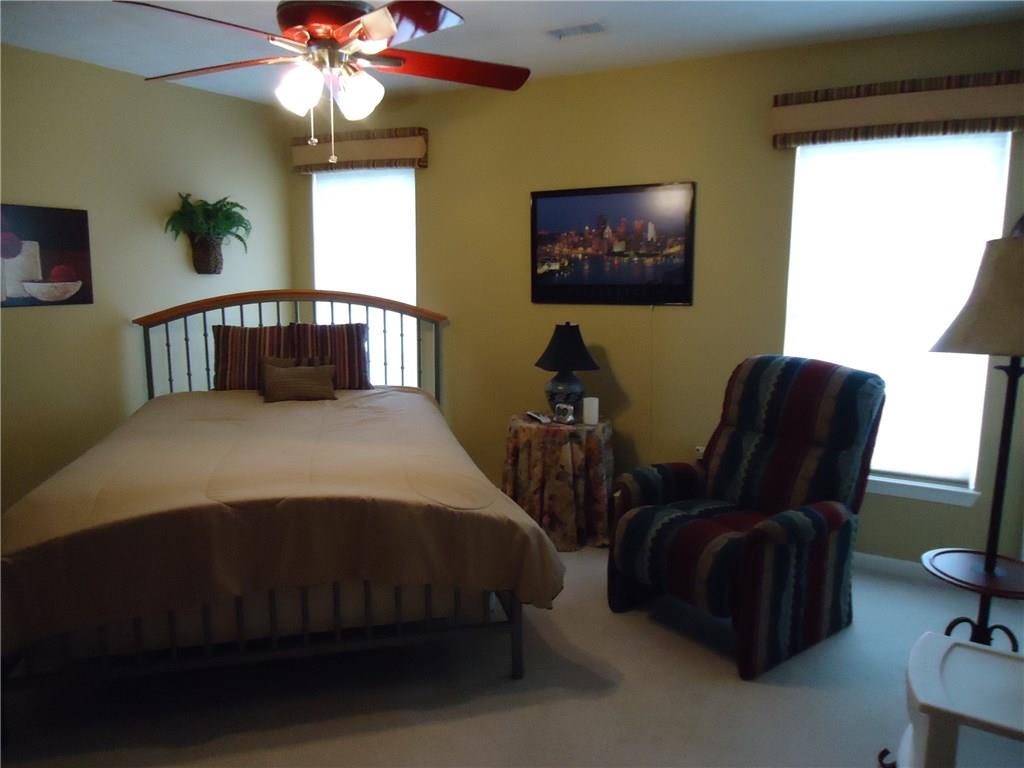 122 Park Place McKees Rocks, PA 15136 - Photo 14 of 21 2nd floor bedroom 2ith walk-in closet and ceiling fan.