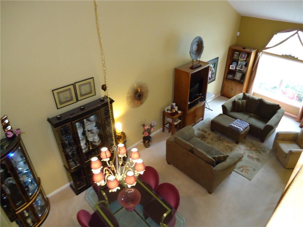 122 Park Place McKees Rocks, PA 15136 - Photo 4 of 21 2 story vaulted ceiling with a Paladium window in the elegant living room