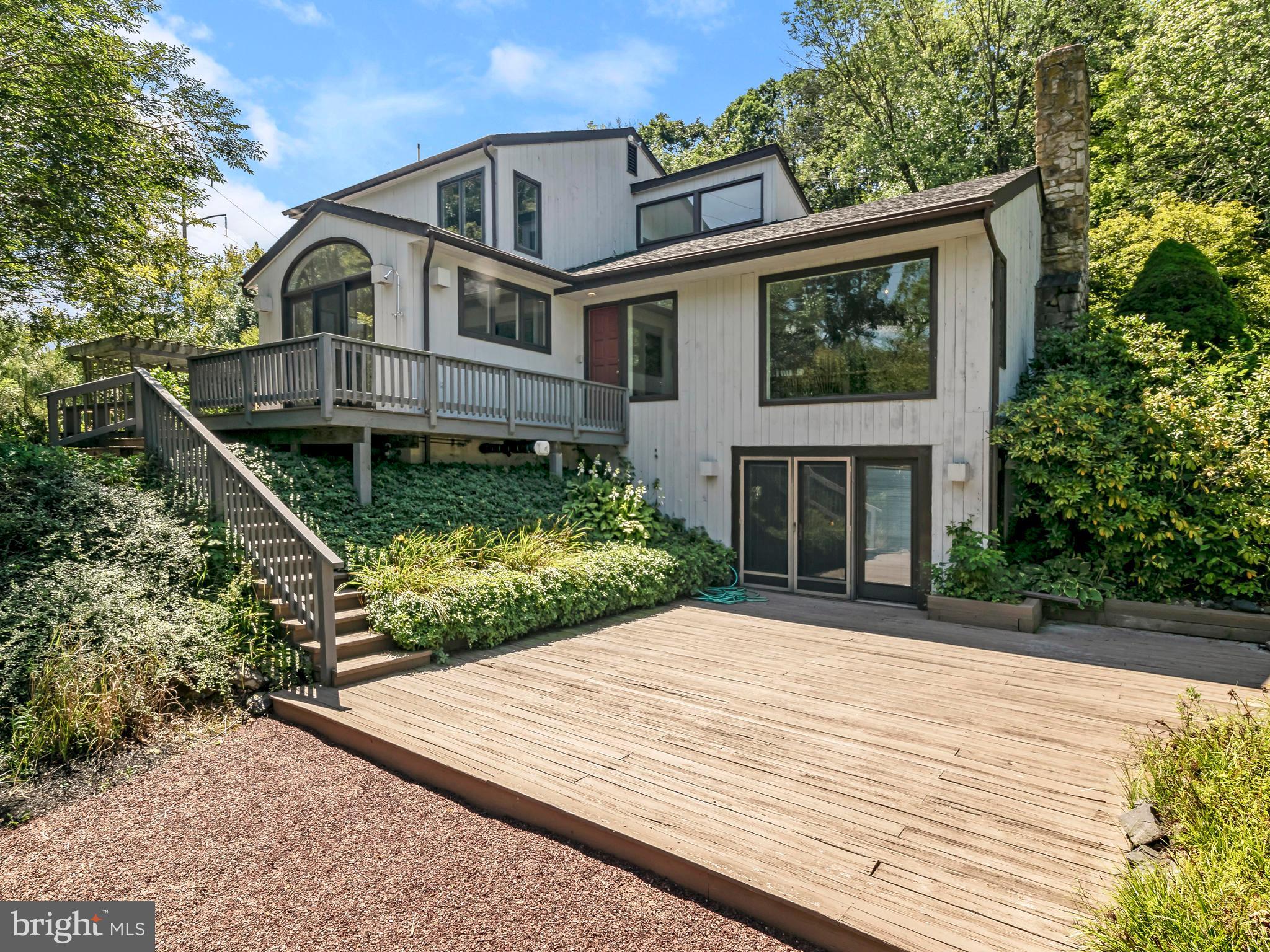 Rear view of home and deck