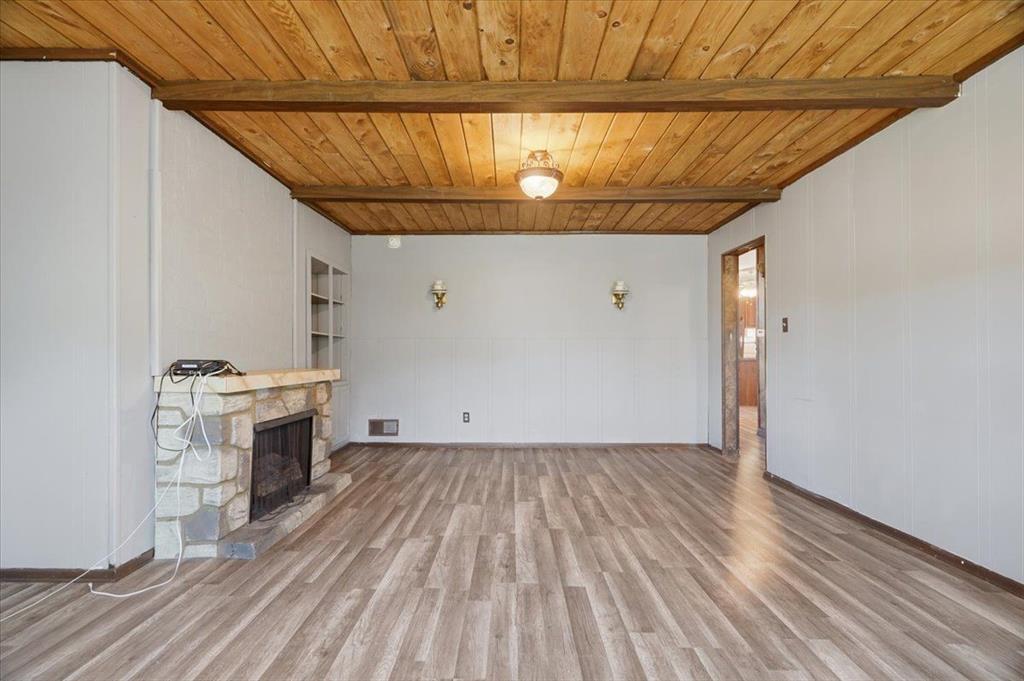 15 Division Street Pittsburgh, PA 15205 - Photo 20 of 44 a view of empty room with wooden floor and fan