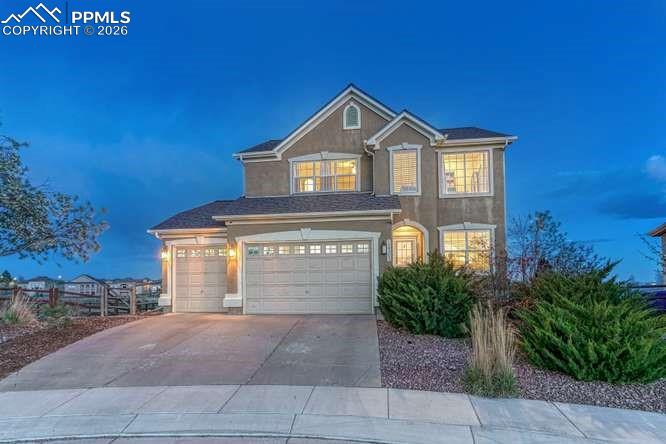 Front of House. 3 Car garage