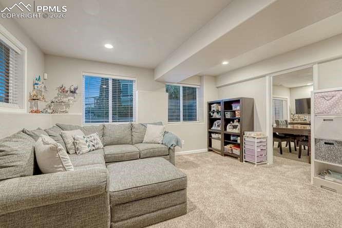 12365 Point Reyes Drive Peyton, CO 80831 - Photo 26 of 44 Family room in garden level basement.