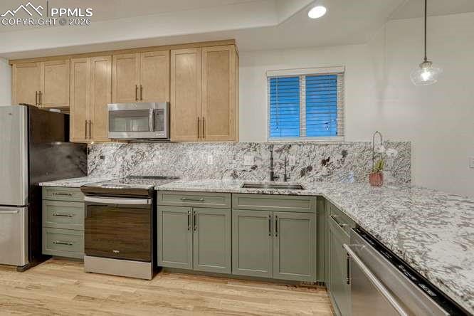 12365 Point Reyes Drive Peyton, CO 80831 - Photo 3 of 44 Kitchen fully updated. Hardwood floor, large pantry. reverse osmosis water system remains