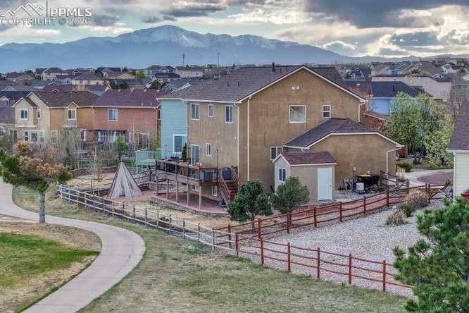 12365 Point Reyes Drive Peyton, CO 80831 - Photo 37 of 44 aerial view of the back of the house, showing shed and deck.
