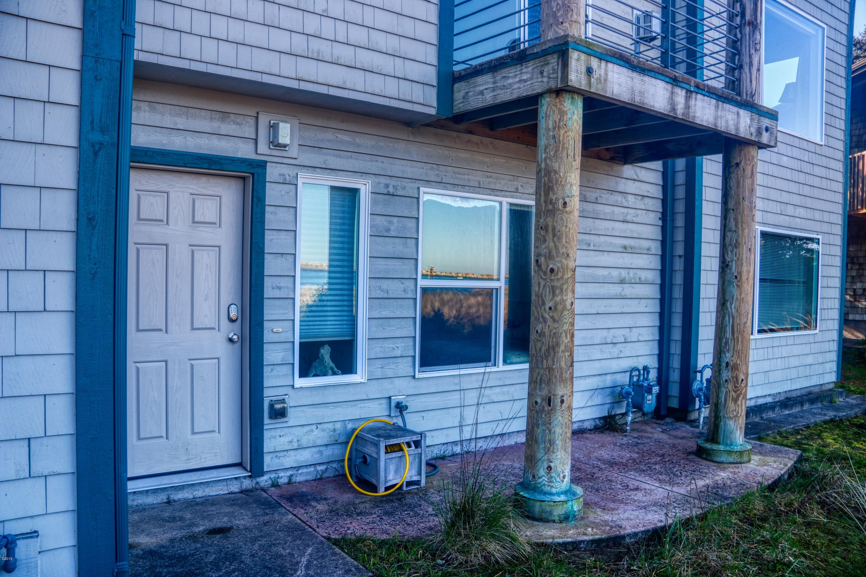 236 Southwest 27th Street South Beach, OR 97366 - Photo 2 of 25 Front Entrance