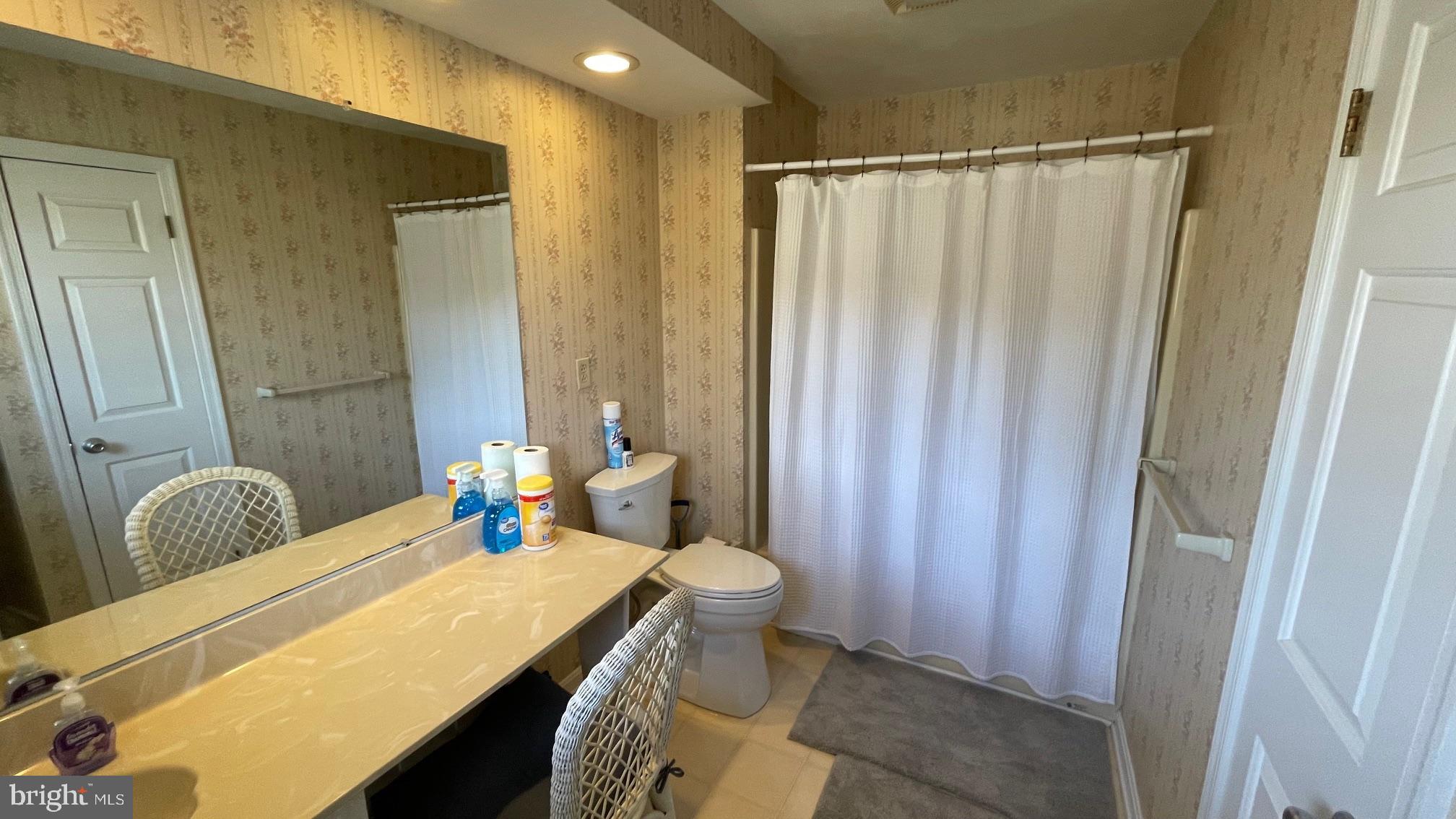 81 Lester Street Keyser, WV 26726 - Photo 34 of 75 a bathroom with a sink toilet and shower