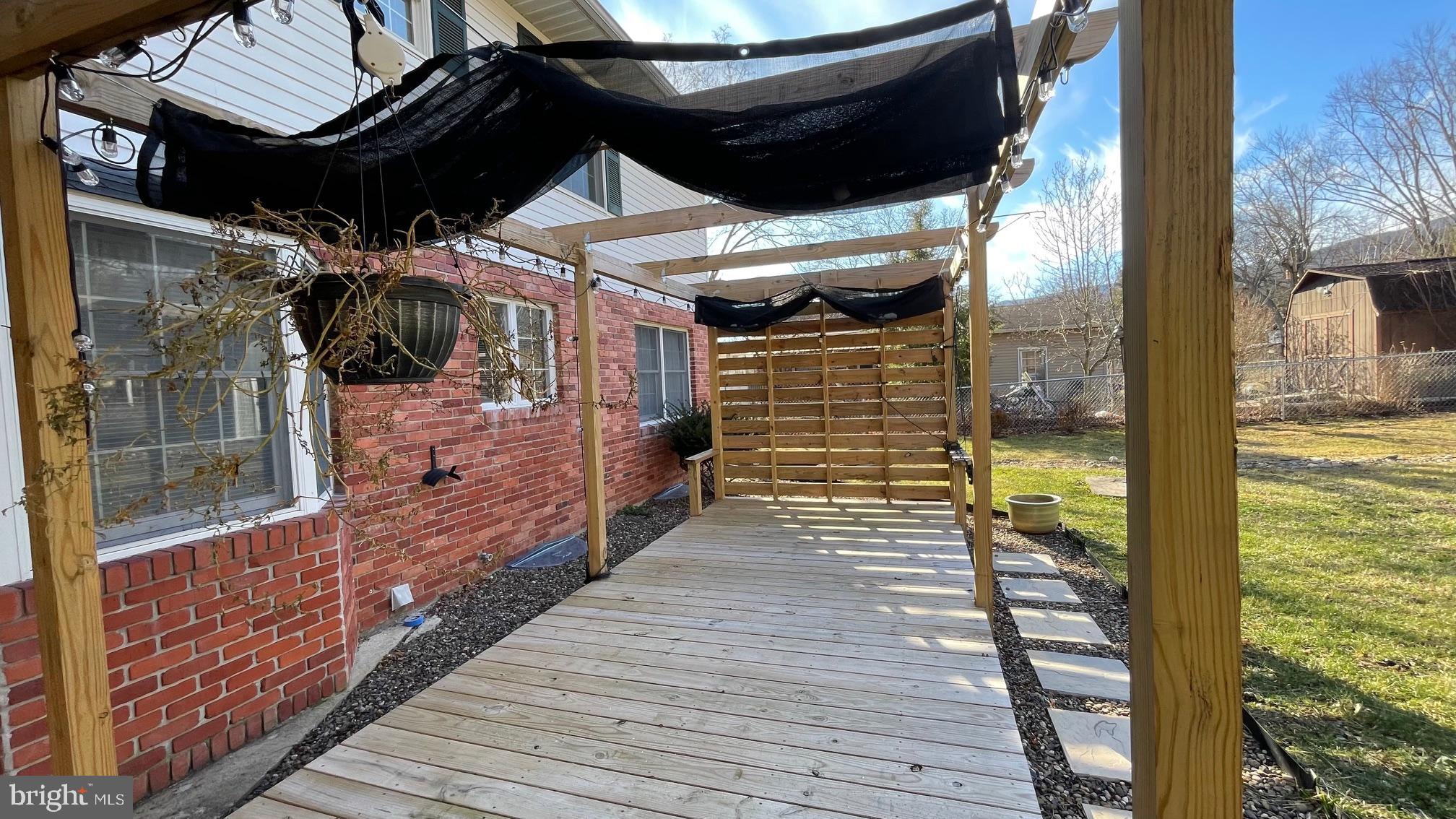 81 Lester Street Keyser, WV 26726 - Photo 46 of 75 a view of water heater room with wooden floor