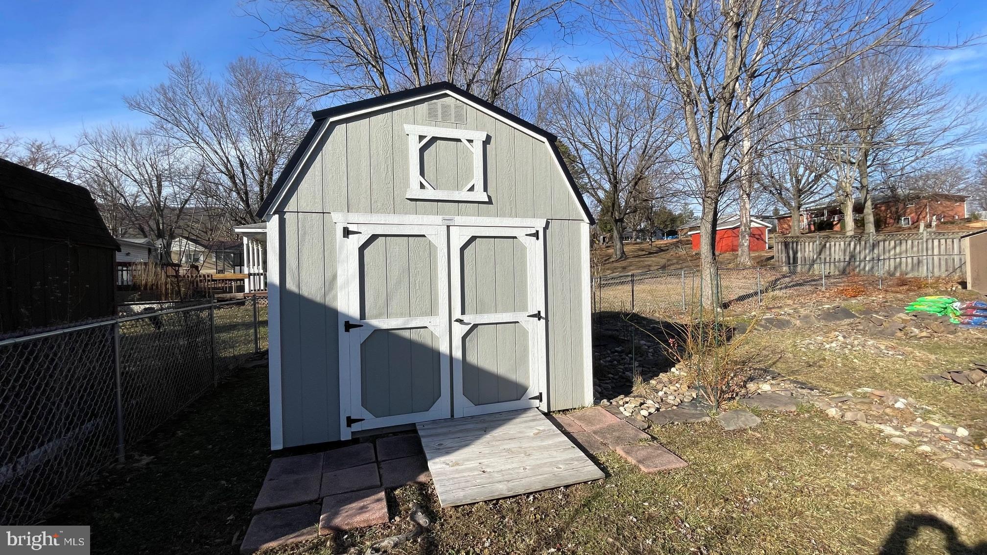 81 Lester Street Keyser, WV 26726 - Photo 48 of 75 a view of a house with a large tree