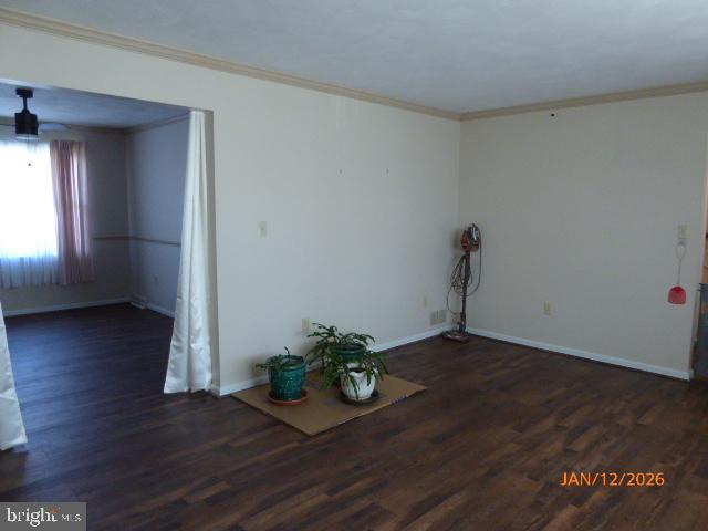 81 Lester Street Keyser, WV 26726 - Photo 51 of 75 a view of an empty room and wooden floor
