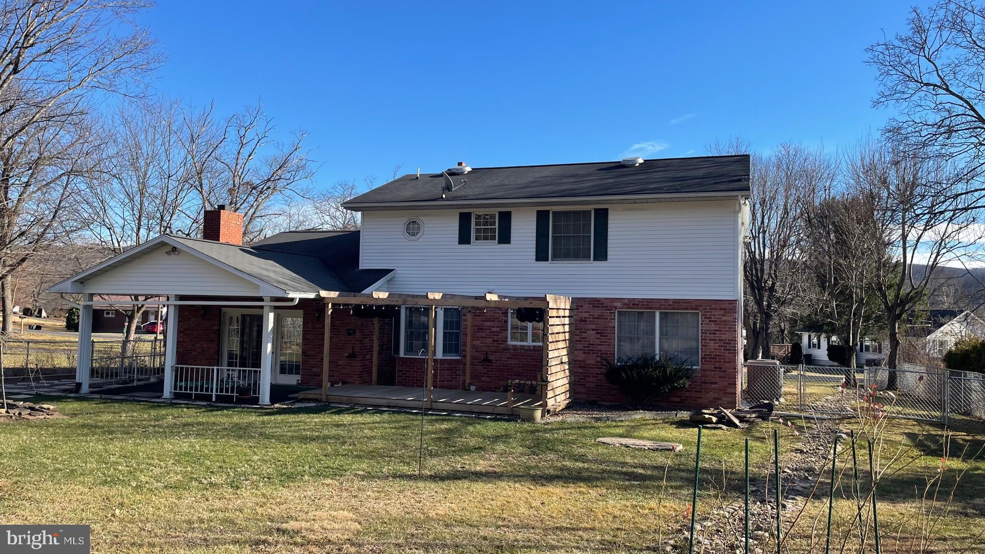 81 Lester Street Keyser, WV 26726 - Photo 59 of 75 a front view of a house with garden