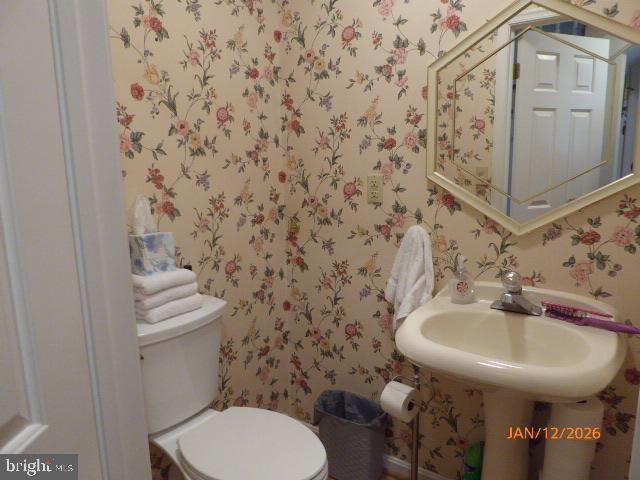 81 Lester Street Keyser, WV 26726 - Photo 6 of 75 a bathroom with a sink and toilet