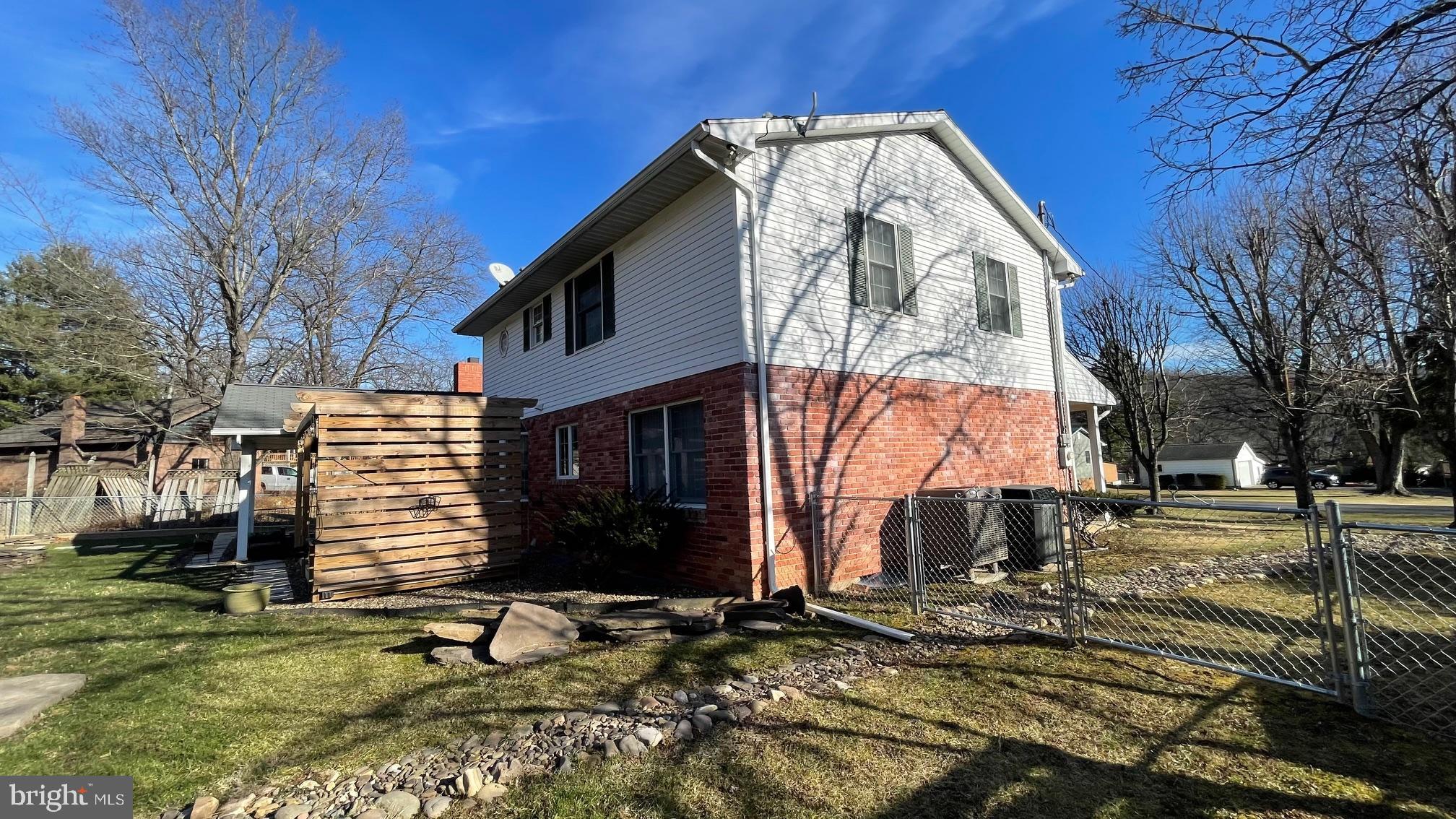 81 Lester Street Keyser, WV 26726 - Photo 62 of 75 a view of a house with a yard