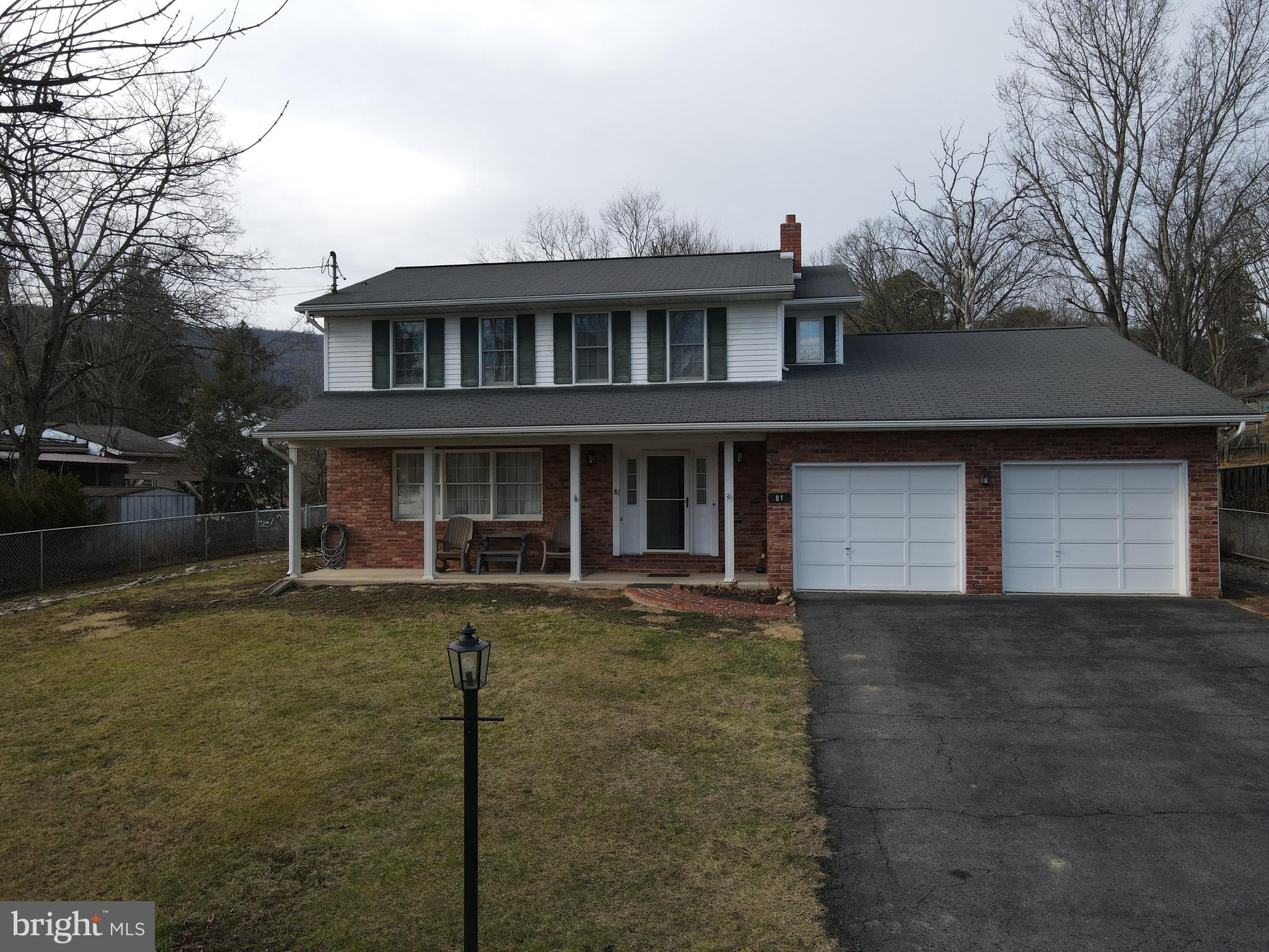 81 Lester Street Keyser, WV 26726 - Photo 63 of 75 a front view of a house with a yard