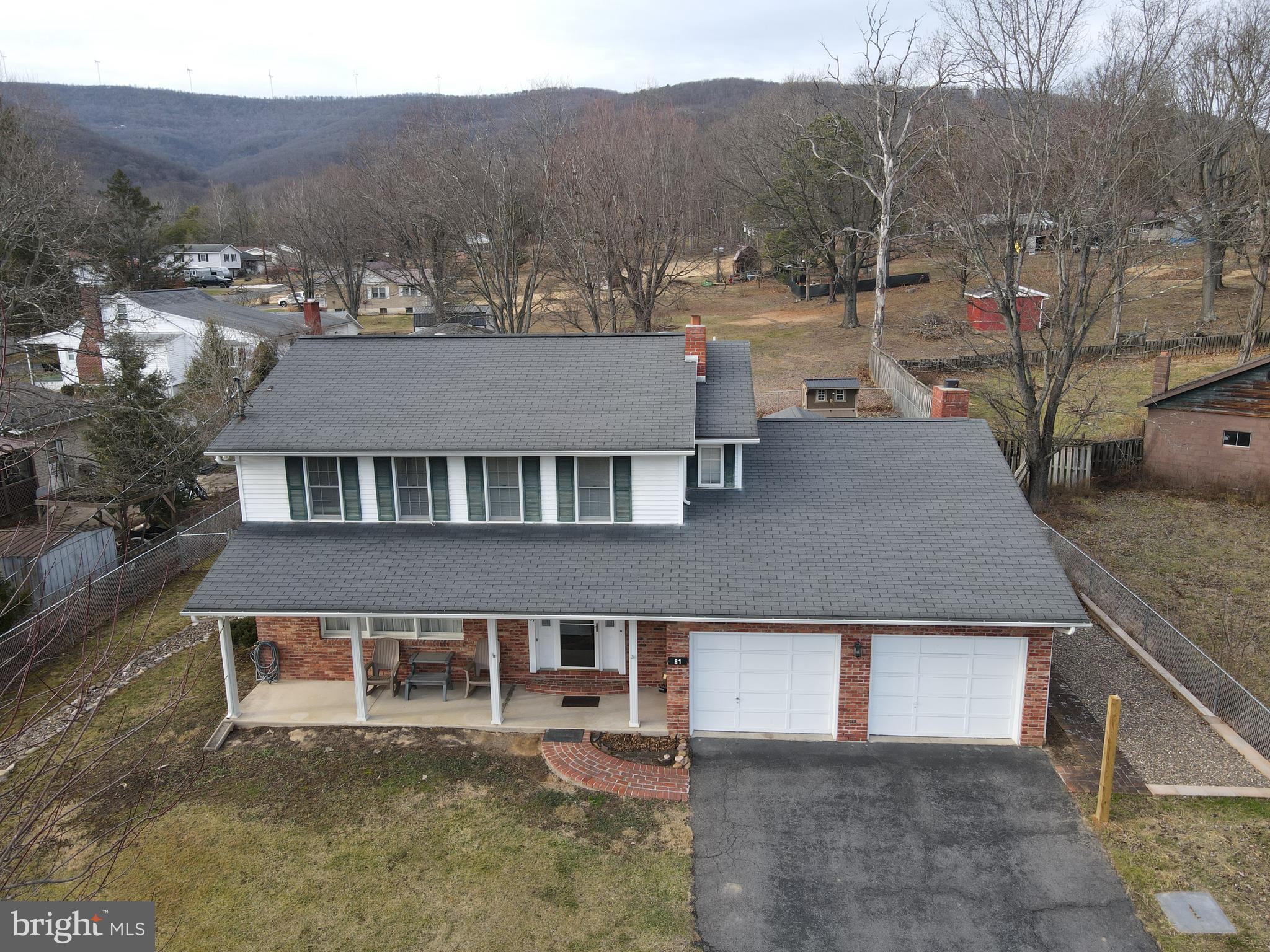 81 Lester Street Keyser, WV 26726 - Photo 65 of 75 an aerial view of a house with a yard