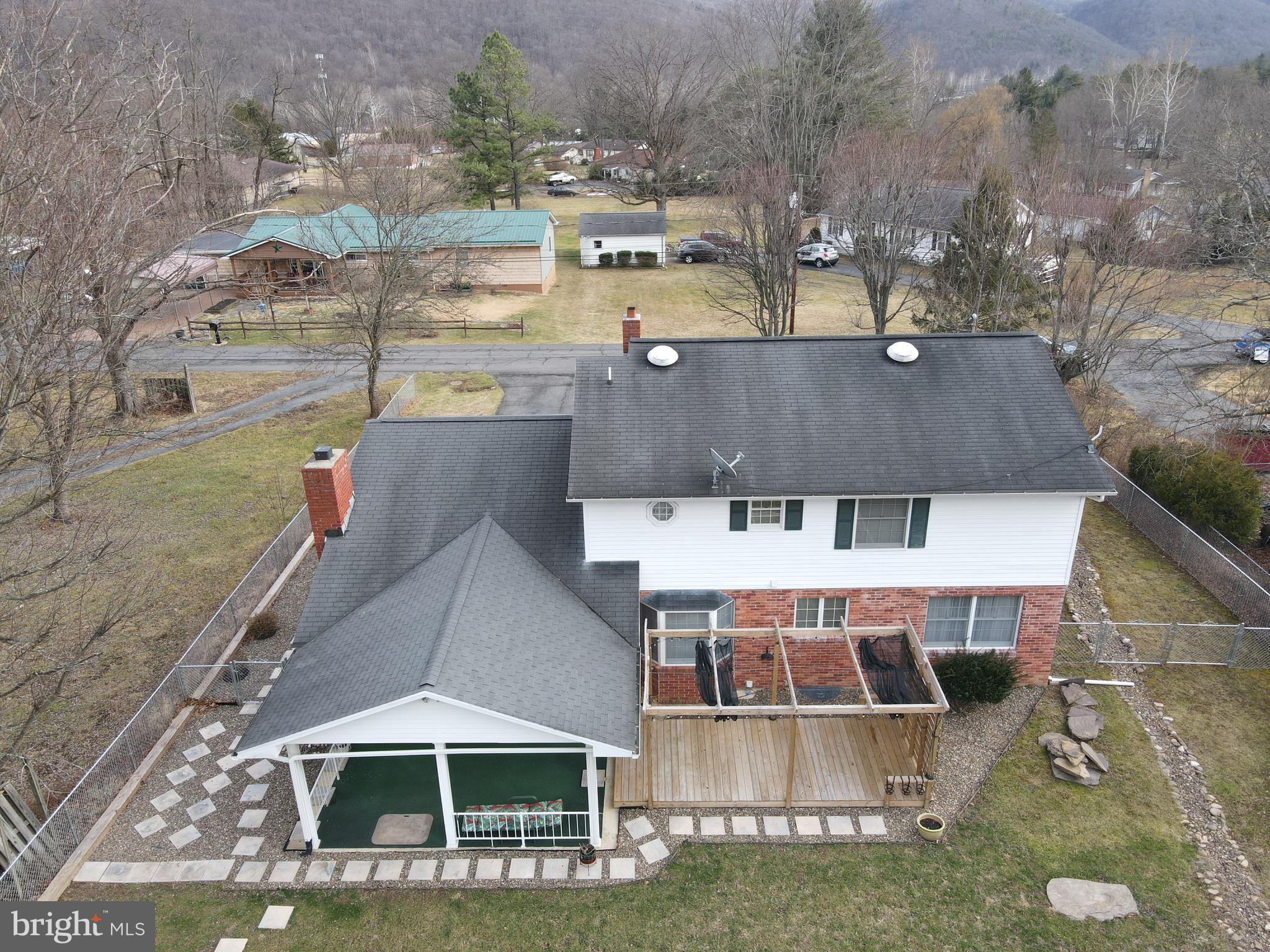 81 Lester Street Keyser, WV 26726 - Photo 66 of 75 an aerial view of residential houses with outdoor space