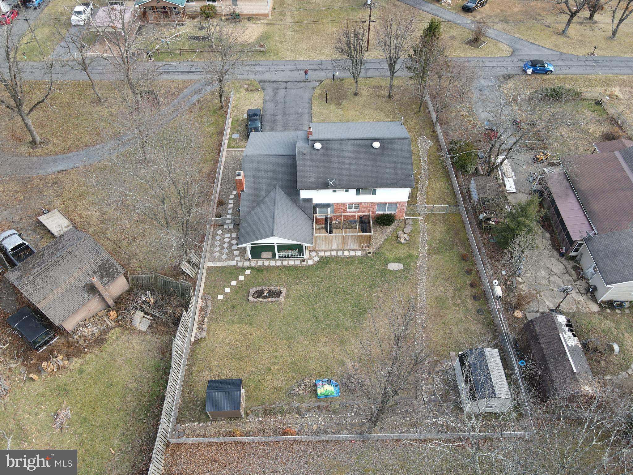 81 Lester Street Keyser, WV 26726 - Photo 72 of 75 an aerial view of a house with a yard