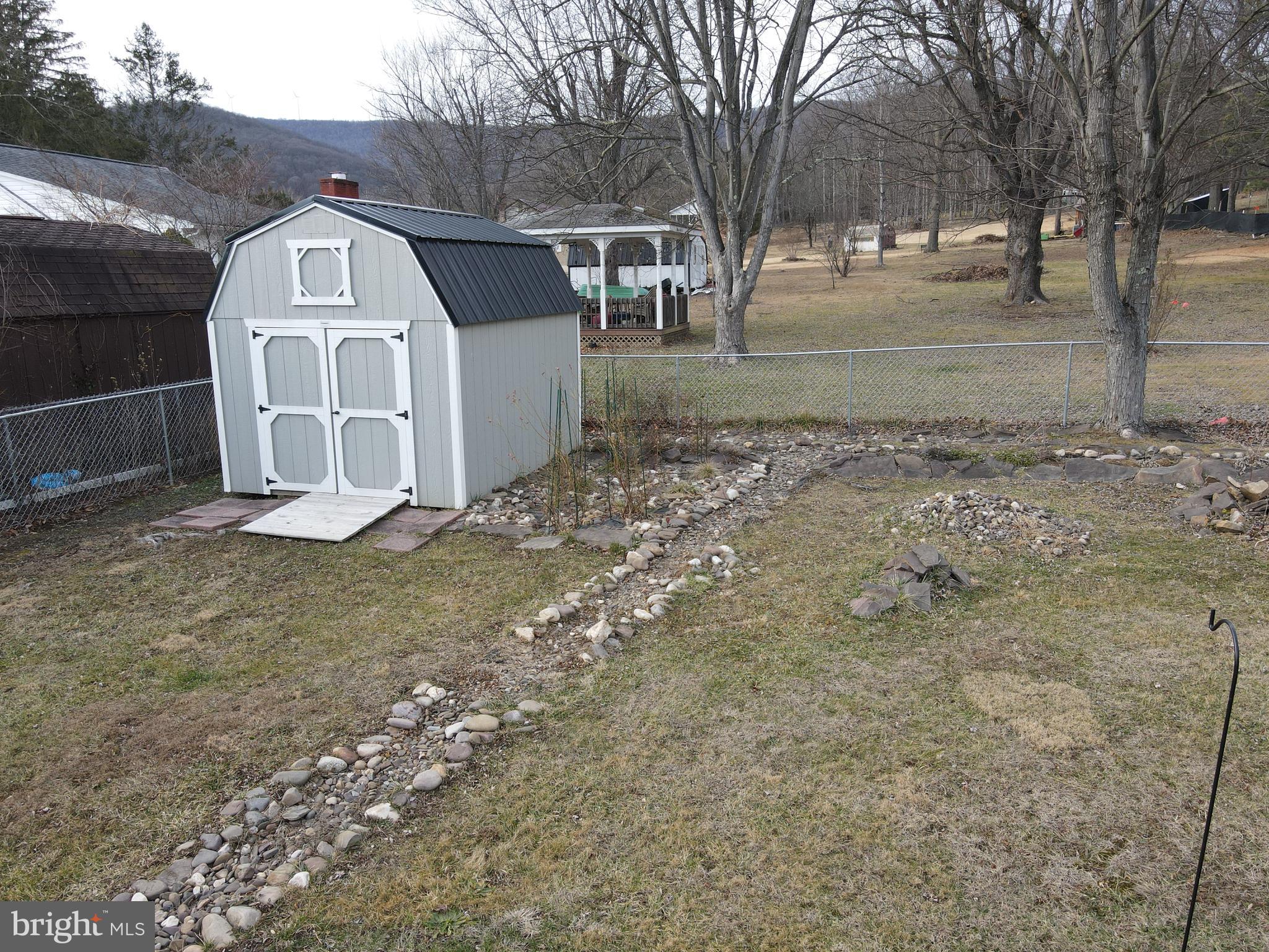 81 Lester Street Keyser, WV 26726 - Photo 75 of 75 a front view of a house with a yard