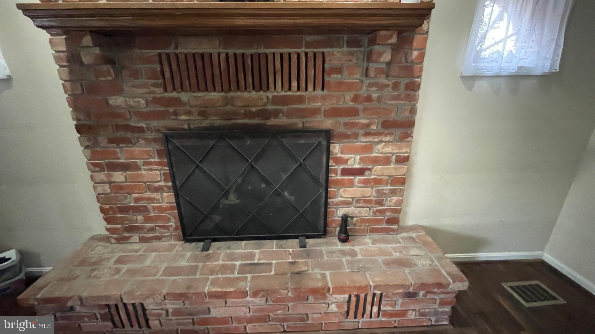 81 Lester Street Keyser, WV 26726 - Photo 8 of 75 a closeup of a fireplace