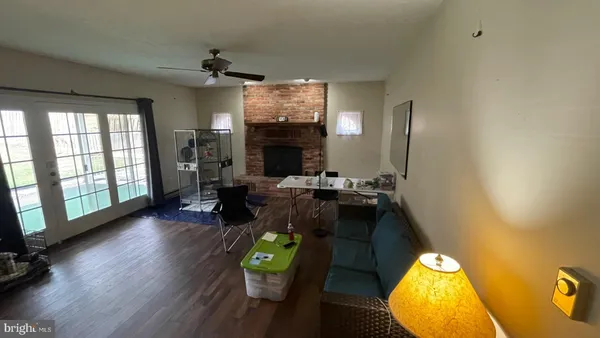 a view of livingroom with furniture window and wooden floor